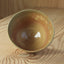 Ceramic bowl on a wooden surface